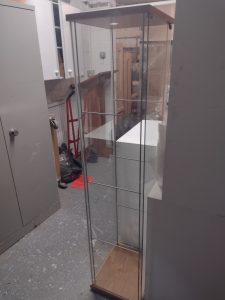 Glass display case, grey surround with 3 shelves